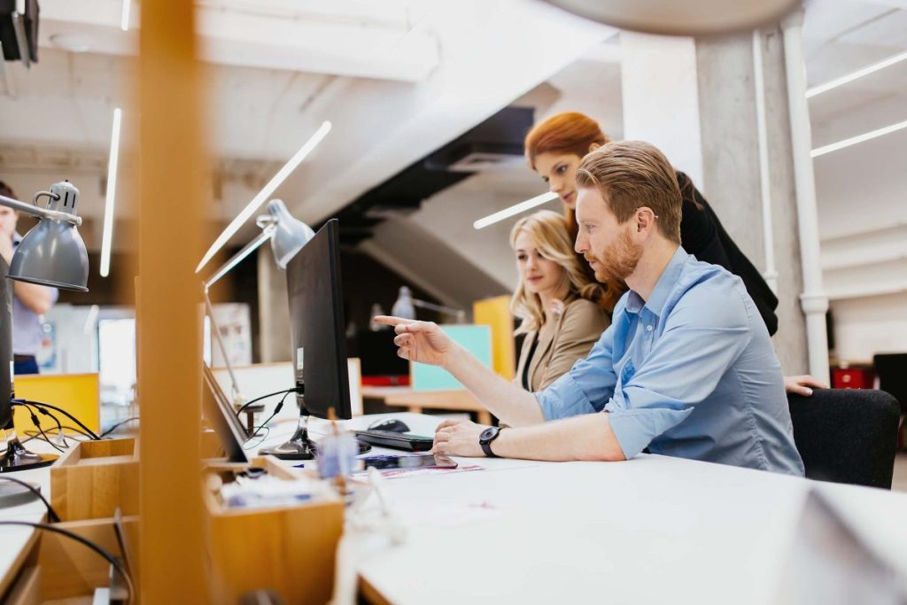 designers-working-as-a-team-in-office-CU4G5DF-1200x800